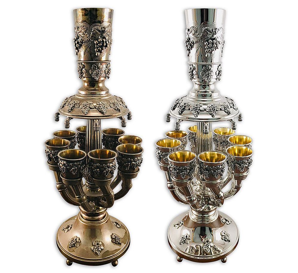 Restored sterling silver Judaica wine fountain with gold-plated interior cups, exemplifying skilled silver polishing and restoration.