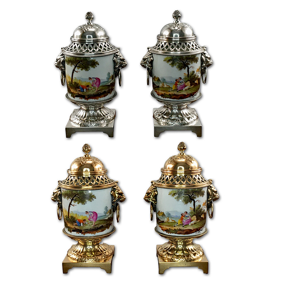Meticulously restored by Chelsea Plating Company, this pair of porcelain and sterling silver urns now shine with 24k gold plating. The artisan's touch is evident in every detail, from the preservation of the delicate porcelain to the transformation of the sterling silver through gold plating. Demonstrating expertise in porcelain restoration, silver plating, gold leafing, and fine art restoration, these urns stand as a testament to timeless elegance and sophistication, enhancing any collection with their unparalleled beauty.