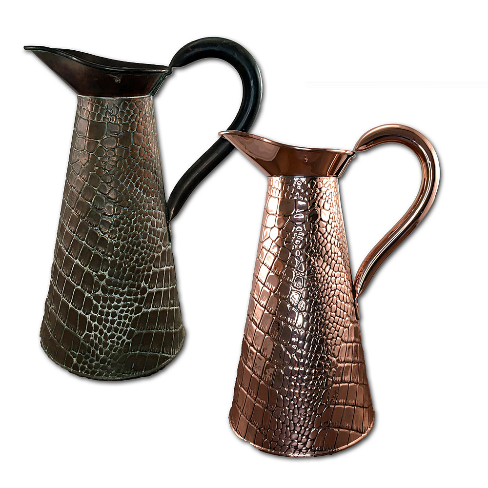 Experience the rustic elegance of this antique copper water pitcher, expertly cleaned and polished by Chelsea Plating Company. Immerse yourself in the rich history and rustic charm of this pitcher, as Chelsea Plating Company revives its natural beauty. From the gleaming copper surface to the graceful curves, every detail of this pitcher reflects the meticulous restoration work performed by Chelsea Plating Company. Embrace the warmth and character of this restored antique copper water pitcher, a testament to Chelsea Plating Company's commitment to preserving the beauty of historical artifacts.