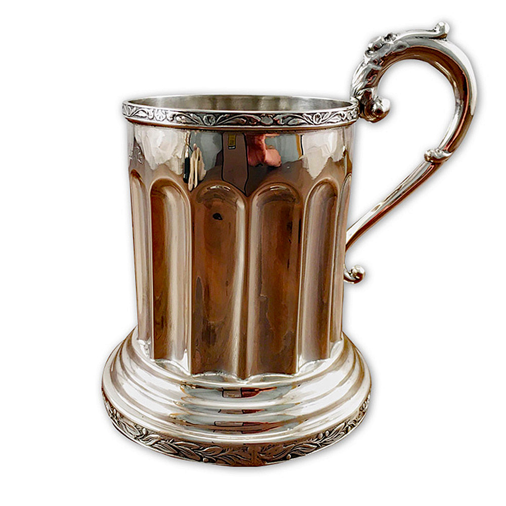  Experience the timeless beauty of this restored sterling silver mug, brought back to its former glory by Chelsea Plating Company. Crafted with exceptional skill, this vintage piece exudes elegance and sophistication. Over time, the mug endured the signs of wear and age, but with the expert restoration services provided by Chelsea Plating Company, it has been rejuvenated. Every detail has been meticulously attended to, ensuring its original charm is fully restored. Through careful polishing, the sterling silver surface now glistens with a radiant sheen. Appreciate the craftsmanship and dedication that went into restoring this sterling silver mug, a true testament to the expertise of Chelsea Plating Company's artisans.