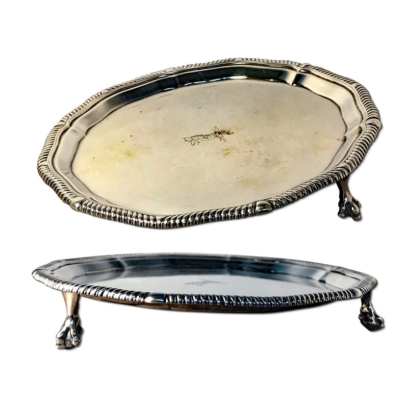 Admire the timeless elegance of this sterling silver footed tray, expertly repaired and polished by Chelsea Plating Company. With its intricate details and impeccable craftsmanship, this tray exudes sophistication and allure. Despite the challenges it faced, Chelsea Plating Company's sterling silver repairs and restoration team successfully repaired the broken foot, restoring the tray's structural integrity. Through their meticulous polishing techniques, they revived its stunning luster, allowing it to shine with renewed brilliance. This sterling silver footed tray stands as a testament to Chelsea Plating Company's expertise in preserving and revitalizing precious silver heirlooms.