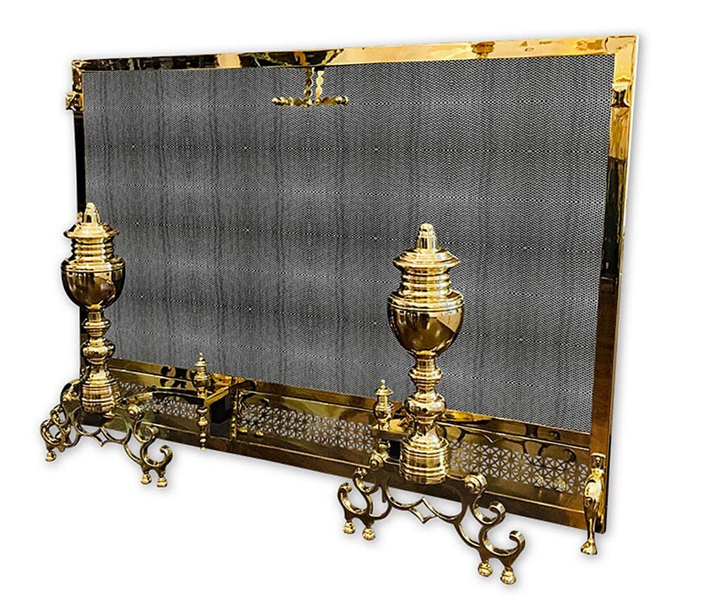 Antique brass fireplace screen and pair of andirons, restored by Chelsea Plating Company, showcasing the grandeur and elegance of historic Philadelphia residences, with a radiant finish reflecting expert brass restoration