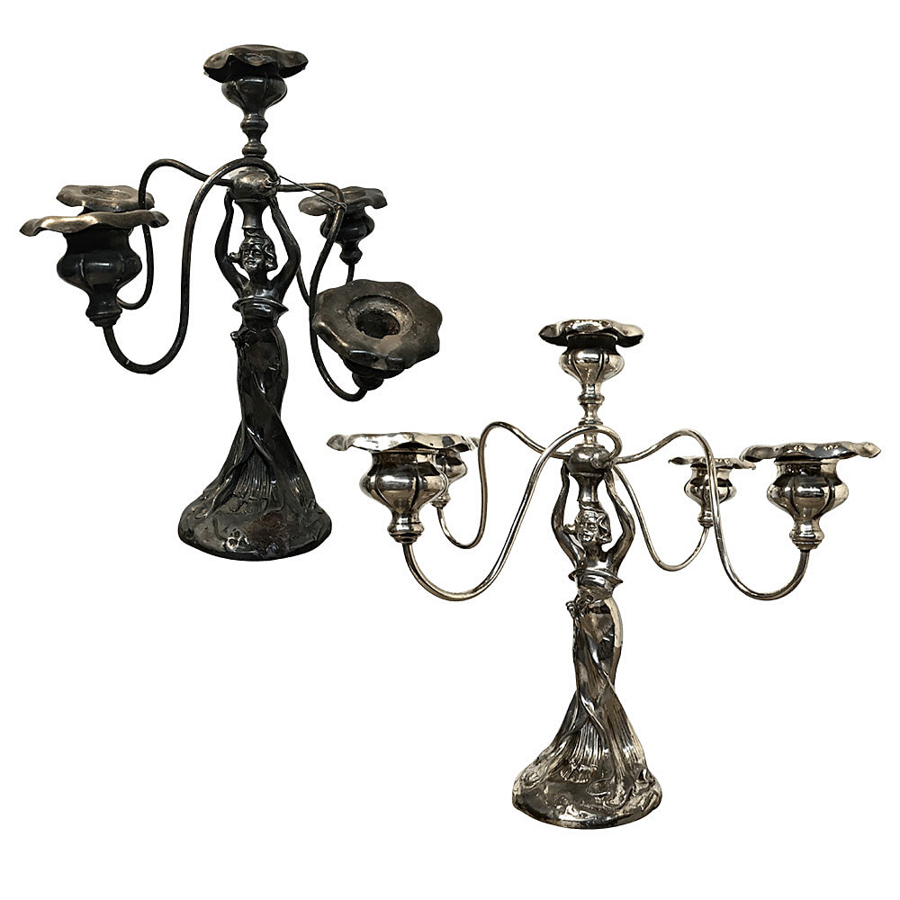  Immerse yourself in the world of Art Nouveau with this beautifully restored antique silver-plated candelabra by Chelsea Plating Company. Once heavily damaged and tarnished, this masterpiece has been meticulously revived to its original splendor. The skilled artisans at Chelsea Plating Company have painstakingly repaired and polished every element of this candelabra, capturing the essence of the Art Nouveau style. From the graceful curves to the intricate details, this restored piece radiates with timeless elegance. Embrace the beauty and craftsmanship of this exquisite treasure, restored to perfection by Chelsea Plating Company's expertise.