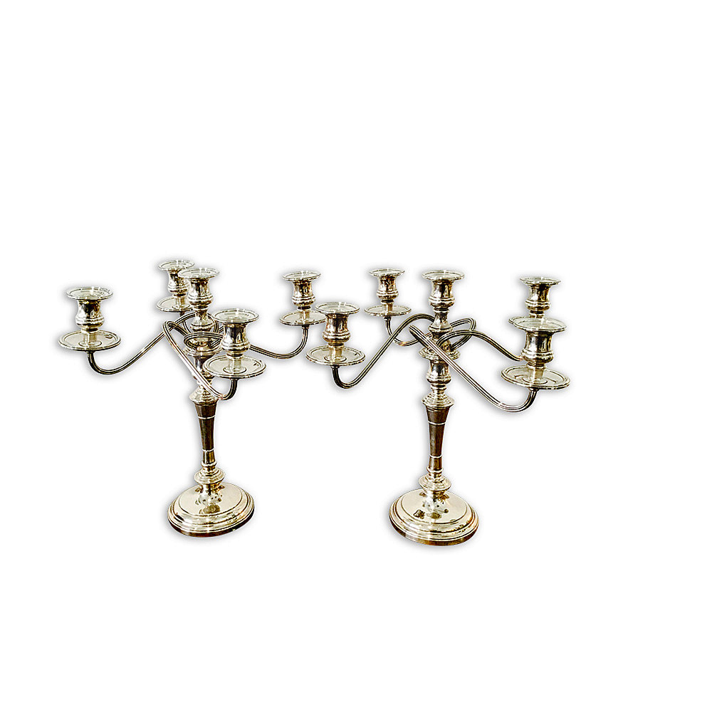 Experience the allure of antique sterling silver candelabra, expertly restored by Chelsea Plating Company. These magnificent candelabra, adorned with intricate Art Nouveau motifs, have been meticulously cleaned and polished to restore their original splendor. The sterling silver surfaces now glisten with a captivating shine, showcasing the craftsmanship and beauty of these restored antique treasures. Chelsea Plating Company's sterling silver restoration expertise brings out the best in these candelabra, making them exquisite focal points in any space.